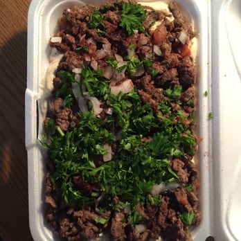 Nate's Deli & Restaurant - Shawarma Plate over Hommus. With onion and parsley. - Delis Near Me - Cleveland, Ohio Nate's Deli & Restaurant - Shawarma Plate over Hommus. With onion and parsley. - Delis Near Me - Cleveland, Ohio