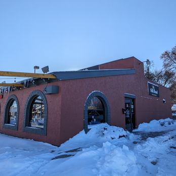 Silk Road - the outside of a building with a crane on top of it - Halal Near Me - Madison, Wisconsin