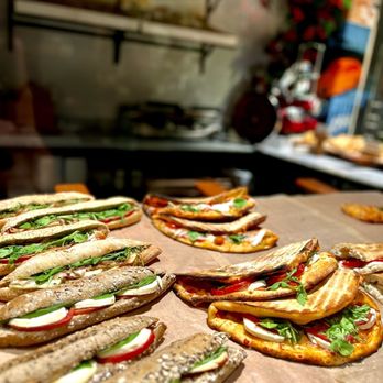 IT Italian Trattoria - Focacia & Panini with tomato mozzarella rugula on display! - Pasta Shops Near Me - Miami Beach, Florida IT Italian Trattoria - Focacia & Panini with tomato mozzarella rugula on display! - Pasta Shops Near Me - Miami Beach, Florida