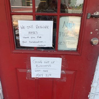 Gulley's Surplus Grocery - a sign on a door - Grocery Near Me - Ruskin, Florida