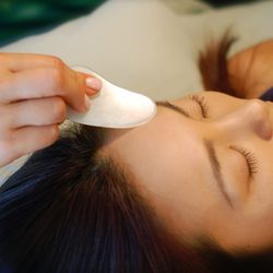 ai acupuncture - Jade gua sha used to smooth, firm and increase circulation