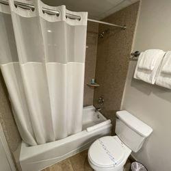 Harborside Hotel - Very dated bathroom. Shower and tub knobs were old and nasty. Tub had small places of rust. Needs to be upgraded.