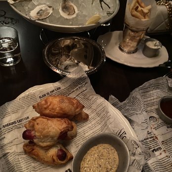 Trivoli Tavern - Pigs in a blanket, oysters, frites, all $5 each for happy hour - American Near Me - Chicago, Illinois Trivoli Tavern - Pigs in a blanket, oysters, frites, all $5 each for happy hour - American Near Me - Chicago, Illinois