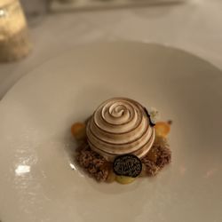 Baked Alaska carrot cake with cream cheese gelato.