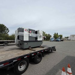 Lawson Drayage - Removed machine form facility and loaded onto line truck.