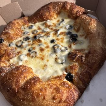 Mellow Mushroom - White pizza with black olives & extra mozzarella & traditional crust. - Pizza Near Me - Huntsville, Alabama Mellow Mushroom - White pizza with black olives & extra mozzarella & traditional crust. - Pizza Near Me - Huntsville, Alabama
