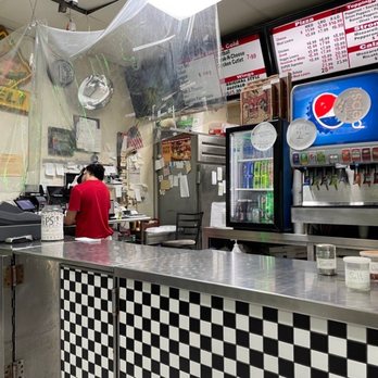 Napoli Pizza - Young man hard at work. Didn't want to show his face and that's ok - Pizza Near Me - Daytona Beach, Florida Napoli Pizza - Young man hard at work. Didn't want to show his face and that's ok - Pizza Near Me - Daytona Beach, Florida