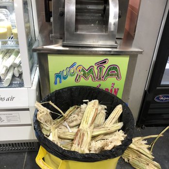 Ben Thanh Plaza - Buy fresh raw sugarcane in the market and they will press it into juice for you here - Meat Shops Near Me - Arlington, Texas