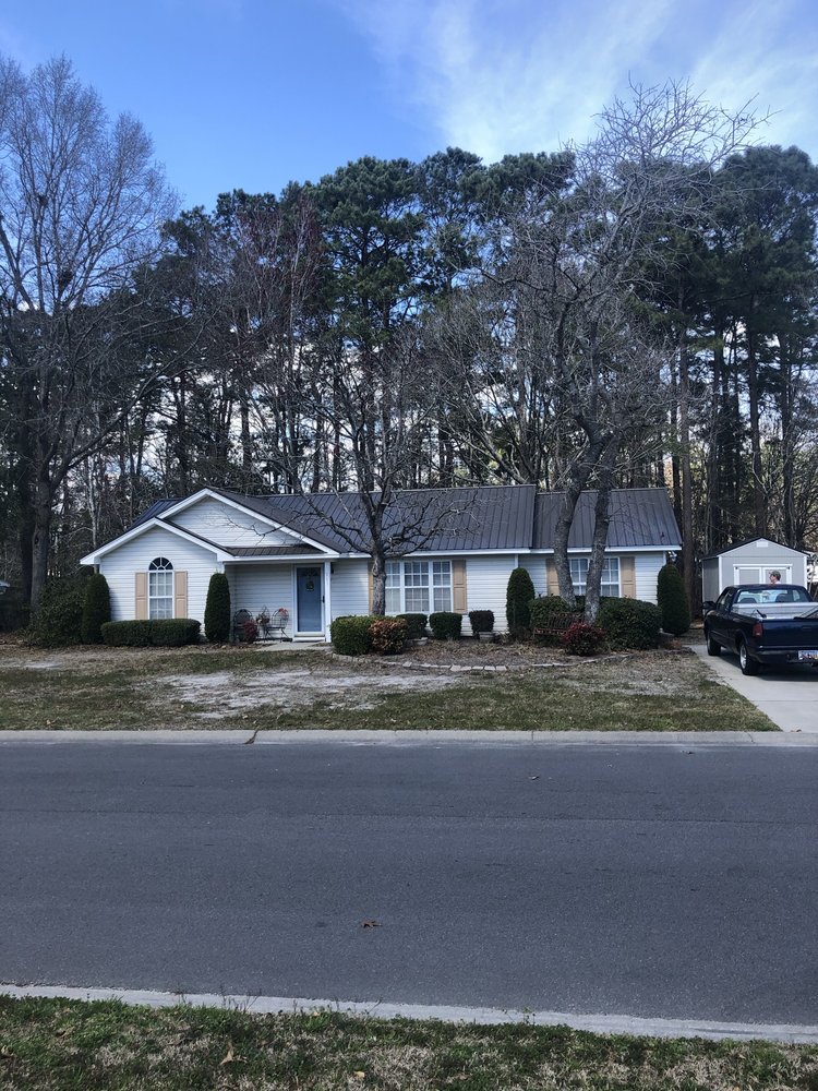 Slide of N&S Roofing