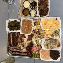 a tray of food and a can of soda a tray of food and a can of soda