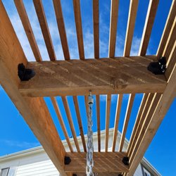 Tried & True Fabrications - Pergola with hanging chairs..