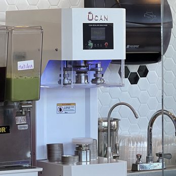 Mochi Lounge - Machine to put the soda can top on the boba drink cup - Donuts Near Me - Anaheim, California Mochi Lounge - Machine to put the soda can top on the boba drink cup - Donuts Near Me - Anaheim, California
