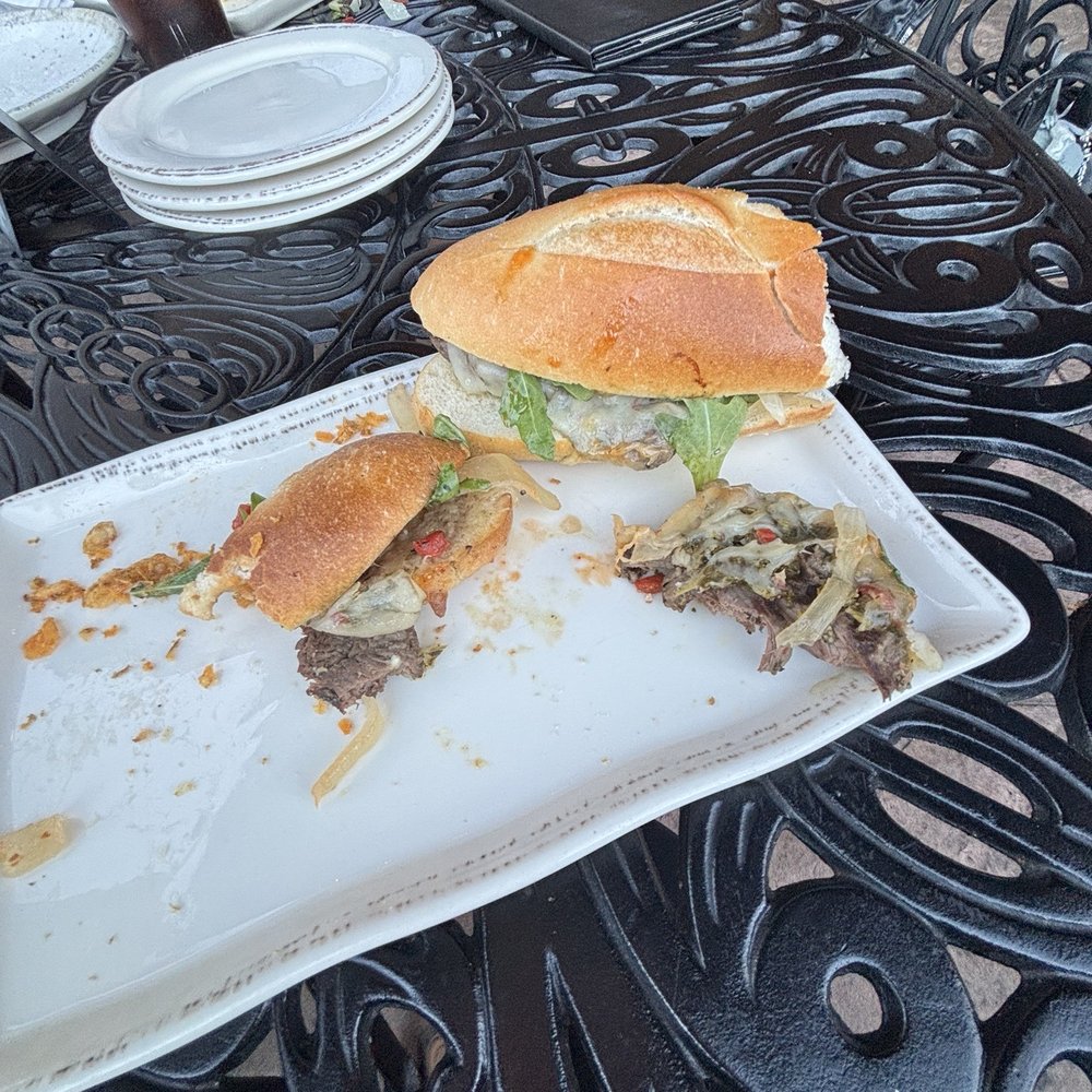 River and Henley - Barely eaten Poppin' Steak Sandwich - New American Near Me - New Milford, New Jersey River and Henley - Barely eaten Poppin' Steak Sandwich - New American Near Me - New Milford, New Jersey