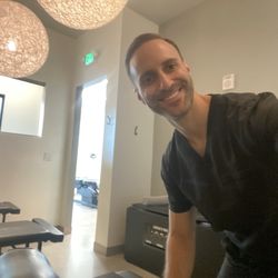Taylor Chiropractic & Wellness - Dr Cliff Taylor prepping me for the traction table!