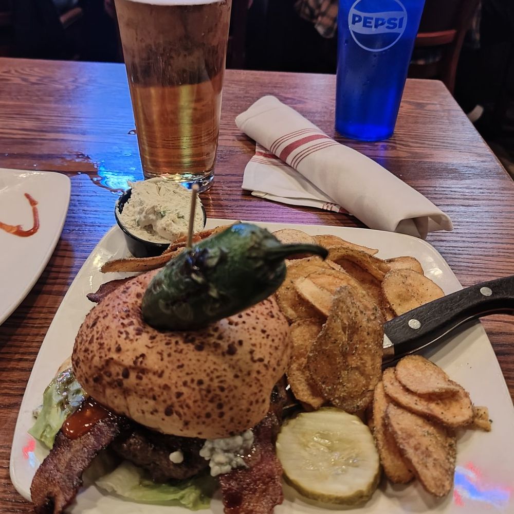Legends Pub & Grill - Bronco burger with side of pub chips, made on site. Lots of bacon! Comes with a pepper! - American Near Me - Boise, Idaho