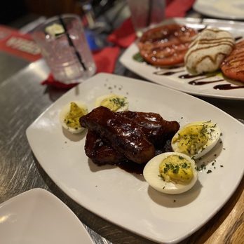 Prime Serious Steak - two plates of food on a table - Seafood Near Me - Port Charlotte, Florida Prime Serious Steak - two plates of food on a table - Seafood Near Me - Port Charlotte, Florida