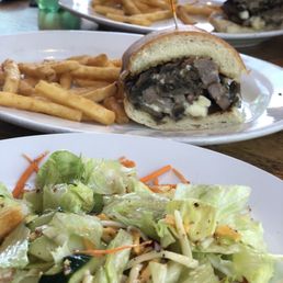 Steak sandwich, fries, house salad.
