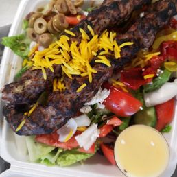 Koobideh kebab with a side of salad
