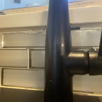River City Fabricators - Bad grout and missing grout. He put counter top of island touching our faucet. Top was not supposed to have any overhand on interior. - Countertop Installation Near Me - Wimberley, Texas River City Fabricators - Bad grout and missing grout. He put counter top of island touching our faucet. Top was not supposed to have any overhand on interior. - Countertop Installation Near Me - Wimberley, Texas