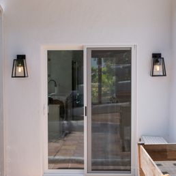 Stucco work finished and new exterior lights. Stucco work finished and new exterior lights.