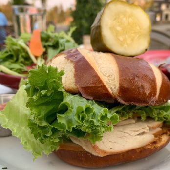 Mammoth Tavern - Turkey, Brie, Sliced Apple, with cranberry mustard on a pretzel bun. Served with your choice of side. Really yummy. - New American Near Me - Mammoth Lakes, California Mammoth Tavern - Turkey, Brie, Sliced Apple, with cranberry mustard on a pretzel bun. Served with your choice of side. Really yummy. - New American Near Me - Mammoth Lakes, California