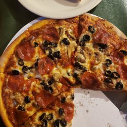Mario's Pizza & Video - Absolutely delicious pizza! The fries are great as well! Cut little pizzeria in Glenwood, NM. Definitely reccomend this place.
