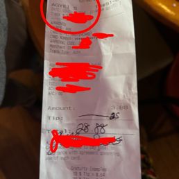The server wrote in 25 dollars in my receipt after crossed it out