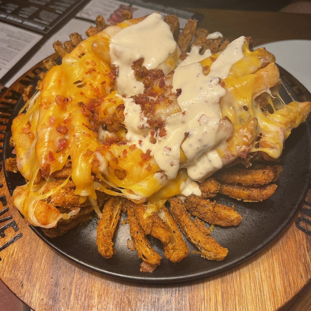 Outback Steakhouse - New loaded Aussie fries and blooming onion - Steakhouses Near Me - Miami, Florida Outback Steakhouse - New loaded Aussie fries and blooming onion - Steakhouses Near Me - Miami, Florida