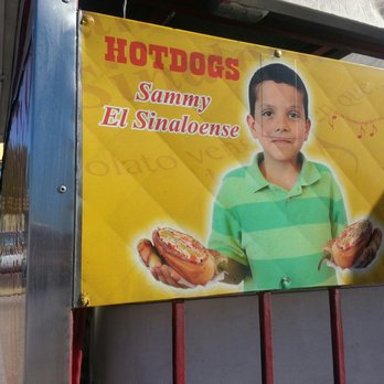 Sammy El Sinaloense Hot Dogs - a boy holding a hotdog - Hot Dogs Near Me - Tucson, Arizona Sammy El Sinaloense Hot Dogs - a boy holding a hotdog - Hot Dogs Near Me - Tucson, Arizona