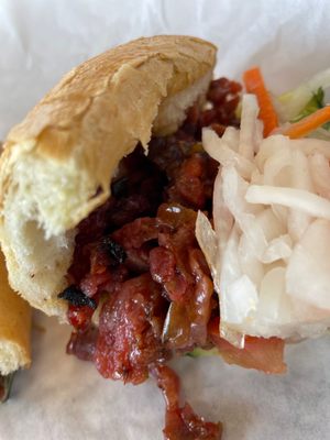 Avian Water and Banh Mi Sandwich by null