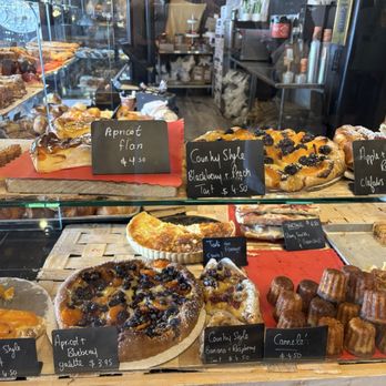 Clafoutis - Display window with many fresh pastries! - French Near Me - Santa Fe, New Mexico