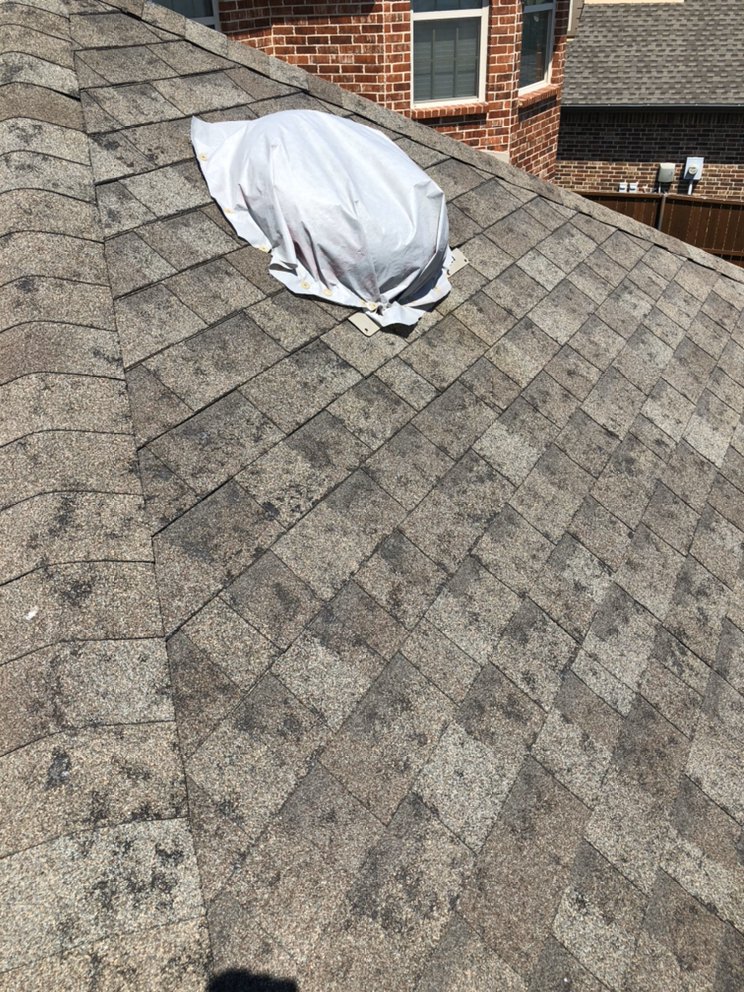 Slide of Osman Roofing Company