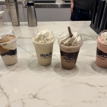 MilkShake Factory Downtown - Our AMAZING milkshakes! From left to right: Peanut Butter Meltaway Cookie, Southern Banana Pudding, Chocolatier, Chocolate Dipped Strawberry - Desserts Near Me - Pittsburgh, Pennsylvania