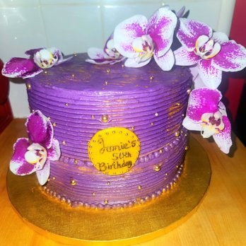 Cupcakery - This is it. Color way off. Two tiers arent even visible. The medallion is not professional at all. - Custom Cakes Near Me - Phoenix, Arizona Cupcakery - This is it. Color way off. Two tiers arent even visible. The medallion is not professional at all. - Custom Cakes Near Me - Phoenix, Arizona