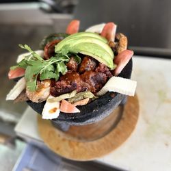 Manny's Rotisserie & Grill - Molcajete