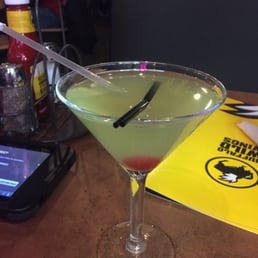 a drink in a martini glass a drink in a martini glass