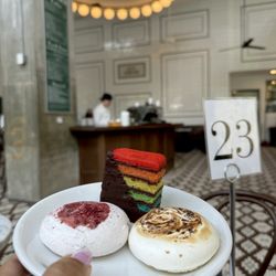Tatte Bakery & Cafe | DC Catering - Pride Cake with the sassy Barista in the back.