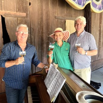 Great Bear Vineyards - Owners Marcus & Jenny being *wowed* by David's piano playing. - Wine Tasting Room Near Me - Davis, California