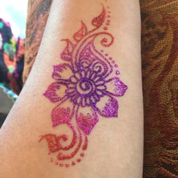 Glitter tattoo on inner forearm (should last about a week)