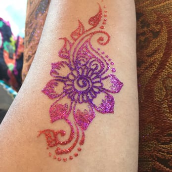 Healing Henna by Robyn Jean - Glitter tattoo on inner forearm (should last about a week) - Face Painting Near Me