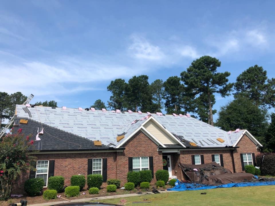 Slide of Hixon's Roofing