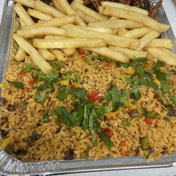 La Bandeja - Family tray for 4-5 people: arroz con gandules (pigeon peas rice), fries, and bone-in BBQ ribs. - Food Trucks Near Me - Ladson, South Carolina