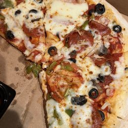 The pizza wasn't cooked it was doughy and gross.