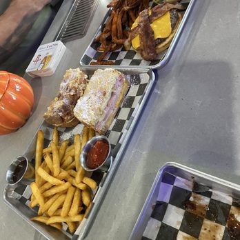 Hero's Bar & Grill - Fried jalapeños , monte Cristo with regular fries and cheeseburger with bacon and sweet potato fries - Sports Bars Near Me - Spring, Texas Hero's Bar & Grill - Fried jalapeños , monte Cristo with regular fries and cheeseburger with bacon and sweet potato fries - Sports Bars Near Me - Spring, Texas