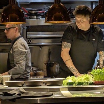 Root & Bone - Kitchen scenes with bright microgreens - Gastropubs Near Me - Pelham, Ontario