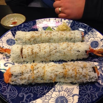 Sushi 1 - Have never had my sushi presented this way before! Top to bottom: California roll, Vegas roll, spicy salmon roll. - Sushi Bars Near Me - Novi, Michigan
