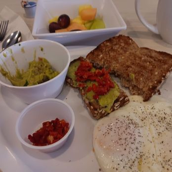 Lincoln Square Pancake House - Two eggs over easy, guacamole, sun dried tomatoes andnfruit - Breakfast & Brunch Near Me - Indianapolis, Indiana Lincoln Square Pancake House - Two eggs over easy, guacamole, sun dried tomatoes andnfruit - Breakfast & Brunch Near Me - Indianapolis, Indiana