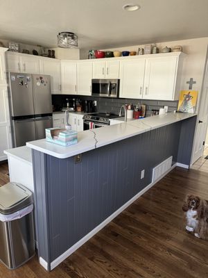 Update kitchen entirely - Updated entire kitchen, New everything, refinish cabinet boxes and hardwood floor.