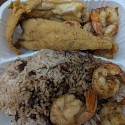 Fried catfish, sauteed shrimp and rice and peas. Fried catfish, sauteed shrimp and rice and peas.