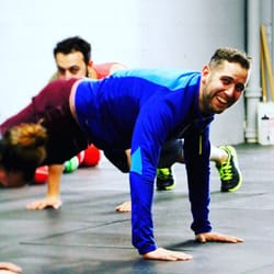 Fitness Union Pdx - Look at that smile!  Push-ups are fun!
